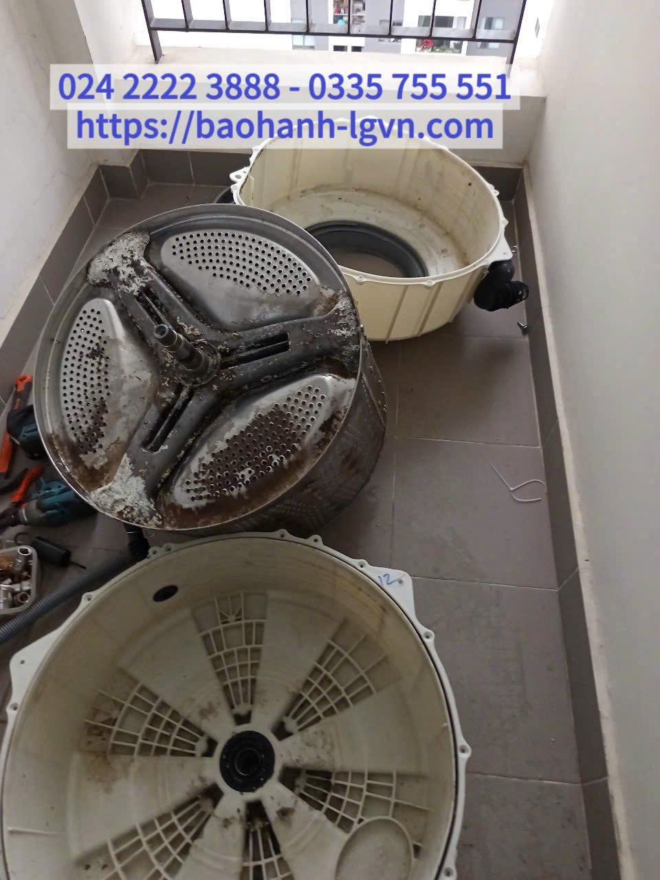 Thay trục càng máy giặt LG